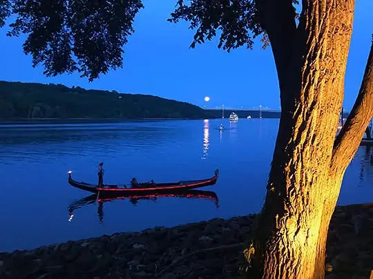 Gondola cruising the St. Croix River at dusk.